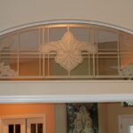 Etched glass transom above french doors